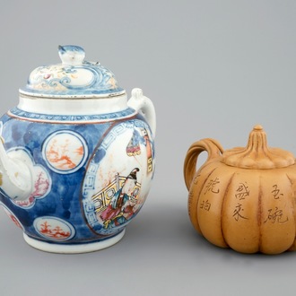 A Chinese famille rose teapot, 18th C. and a Yixing teapot, 19/20th C.